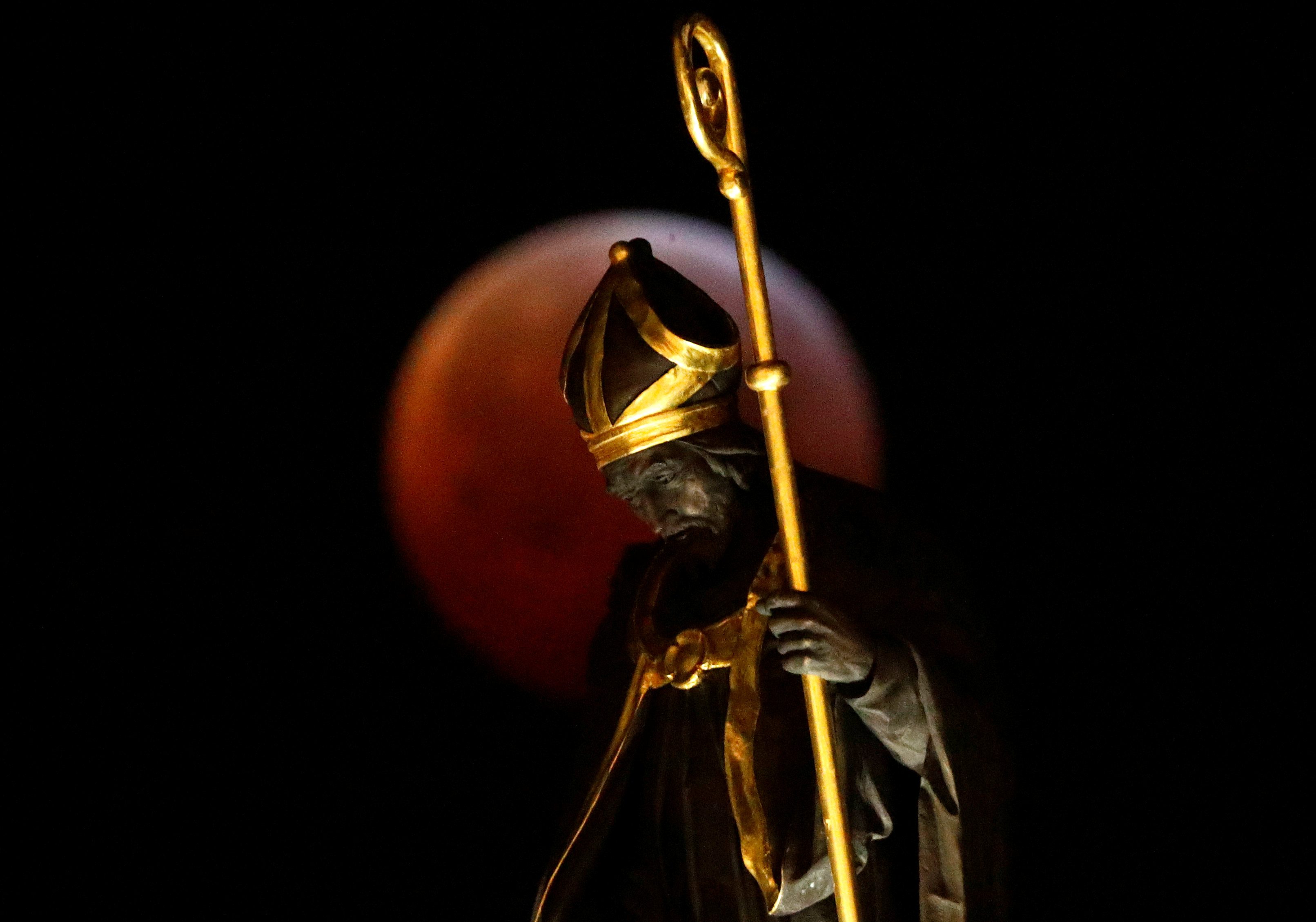 eclipse lunar super luna the  blood wolf moon is seen during a on brussels grand place