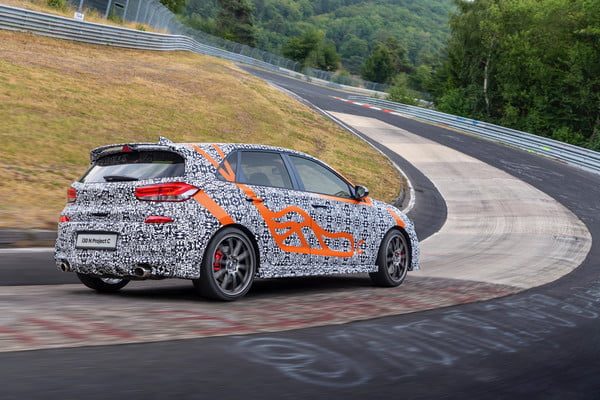 hyundai i30 n project c driving rear 1 600x400