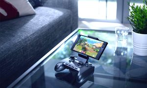 teléfono android con un controlador sobre una mesa – joystick para Android