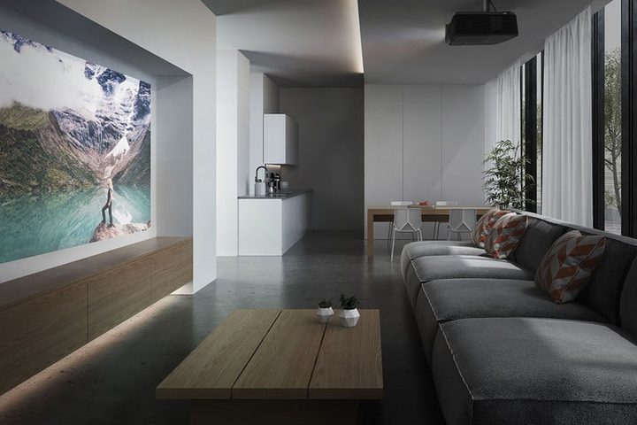 Una sala con el proyector Optoma HD146X al techo, uno de los mejores proyectores para cine en casa