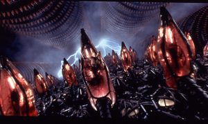 En Matrix, las máquinas que controlan al mundo fabrican humanos en cápsulas que funcionan como vientres artificiales.