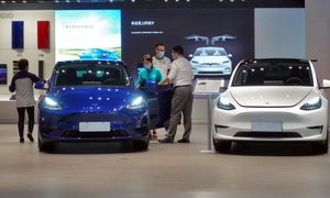tesla vende microfono karaoke china q2 delivered vehicles record high