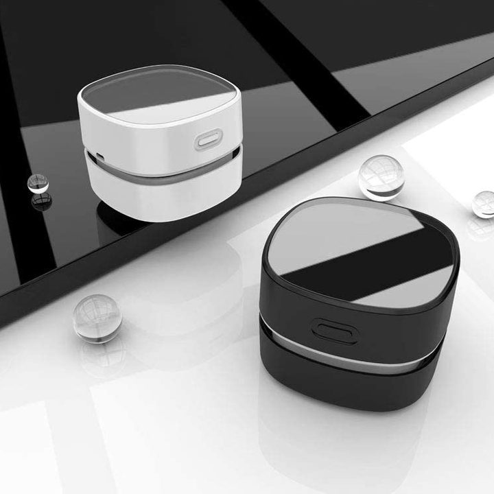 Miniaspiradora ODISTAR en colores blanco y negro.