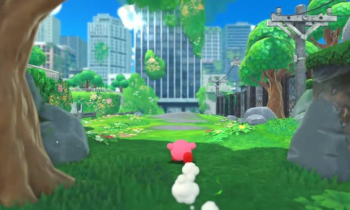 Kirby corre por una ciudad en Kirby and the Forgotten Land.