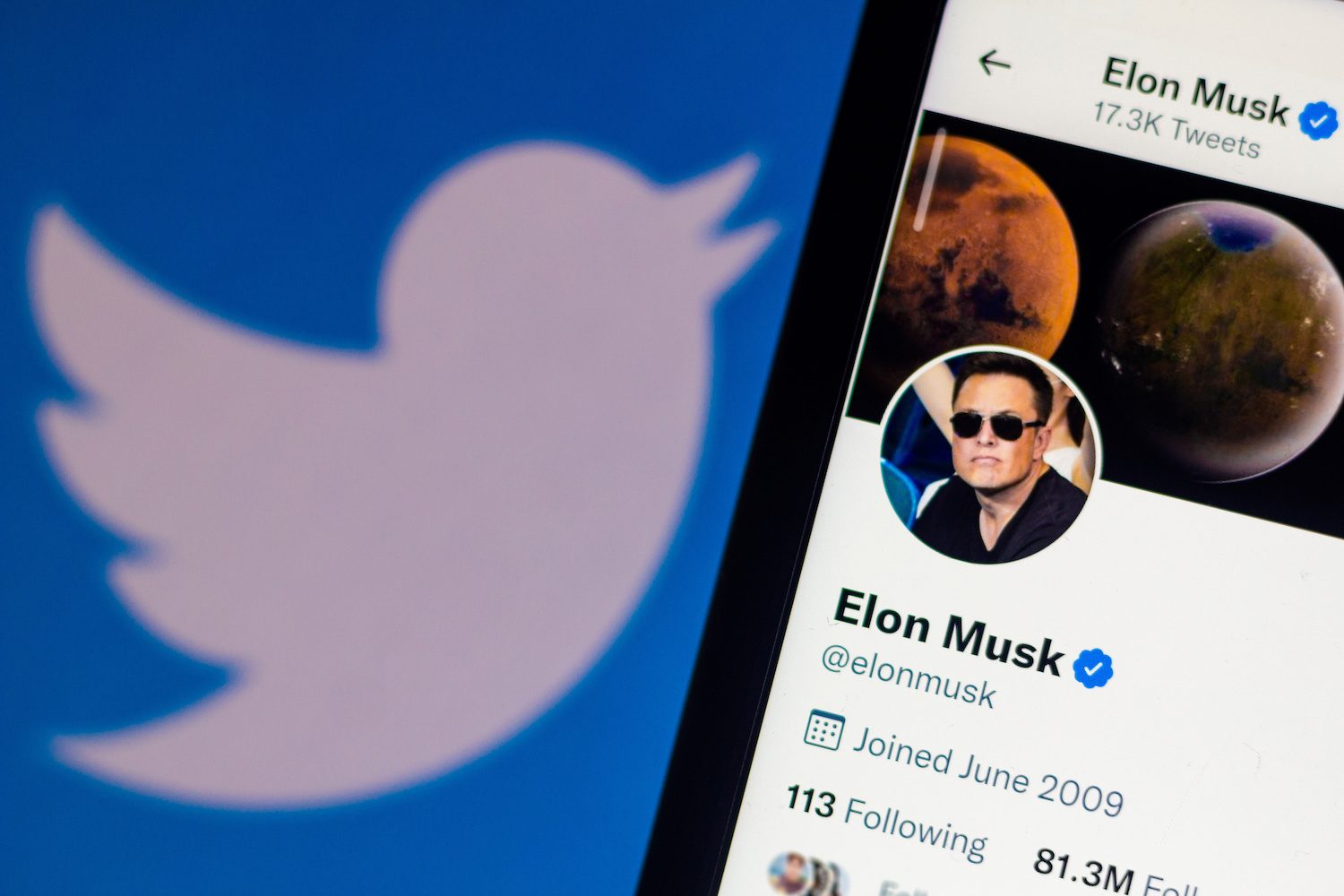 In this photo illustration, the official profile of Elon Musk