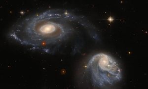 telescopio espacial hubble dos galaxias interaccion deformadas fuerza gravitacional arp madore 608 333