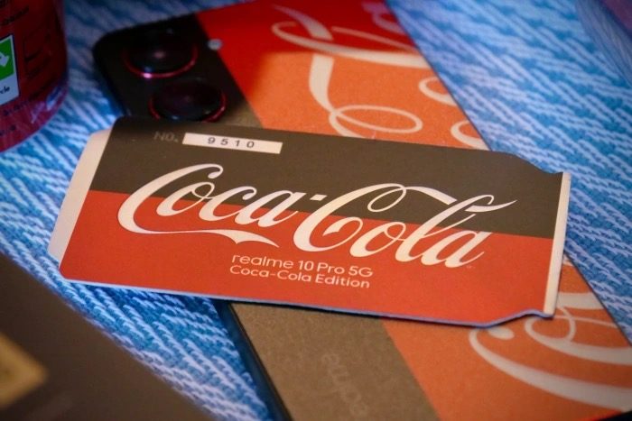 telefono realme coca cola x number can