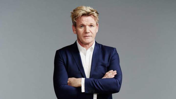 Gordon-Ramsay looks straight ahead with crossed arms