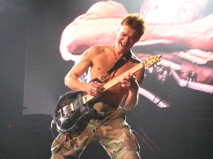 Eddie Van Halen shredding his guitar while playing Eruption.Eddie Van Halen shredding his guitar while playing Eruption.