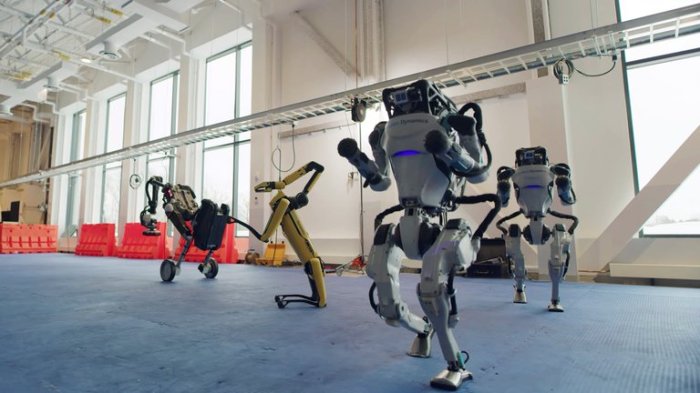 La imagen muestra a los robots de Boston Dynamics bailando.