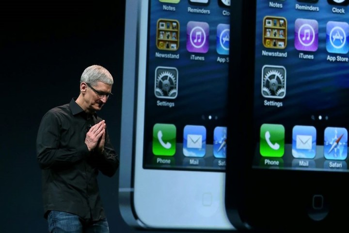An Apple executive showing off the iPhone 5