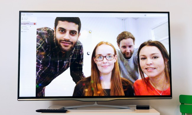 videollamadas por tv business people on screen in video conference room at creative office