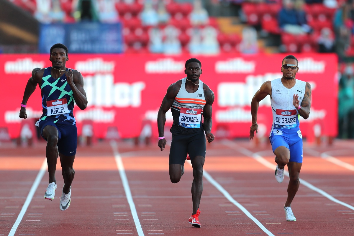 El sudafricano Akani Simbine, el estadounidense Trayvon Bromell y el canadiense Andre de Grasse.