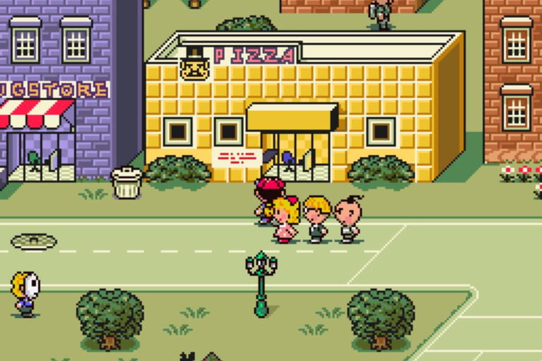 Ness y sus amigos afuera de una pizzería.