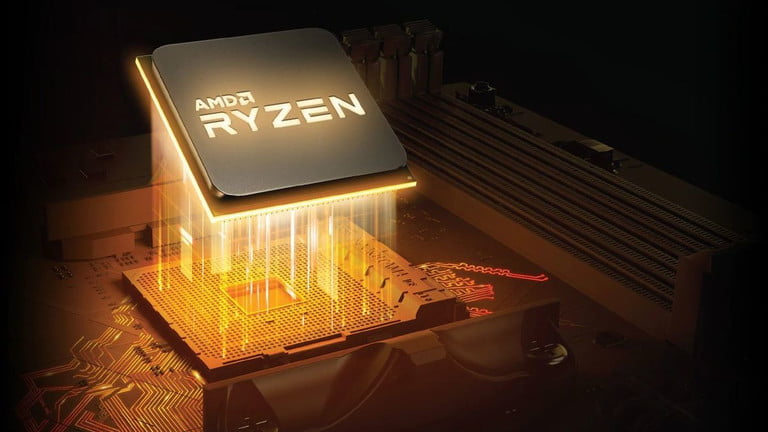 Imagen de un procesador entrando en un zócalo de una placa base, para conocer todo acerca de AMD Ryzen 6000