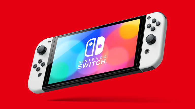 Nintendo Switch OLED blanco en modo portátil, para comparar a la Switch Lite vs. Switch vs. Switch OLED