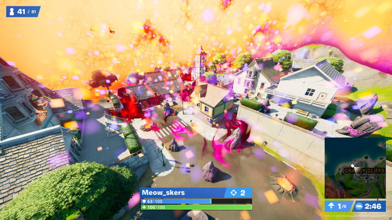 Frame de Fortnite mostrando una calle y casas a los lados.