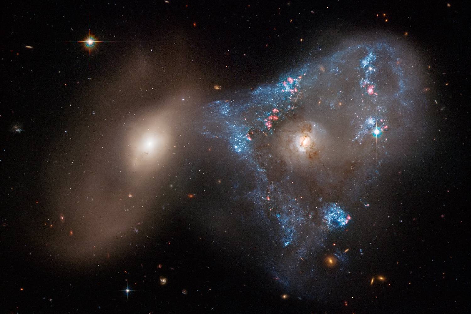 Colisión de galaxias captadas por el Hubble