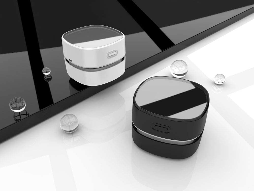 Miniaspiradora ODISTAR en colores blanco y negro.