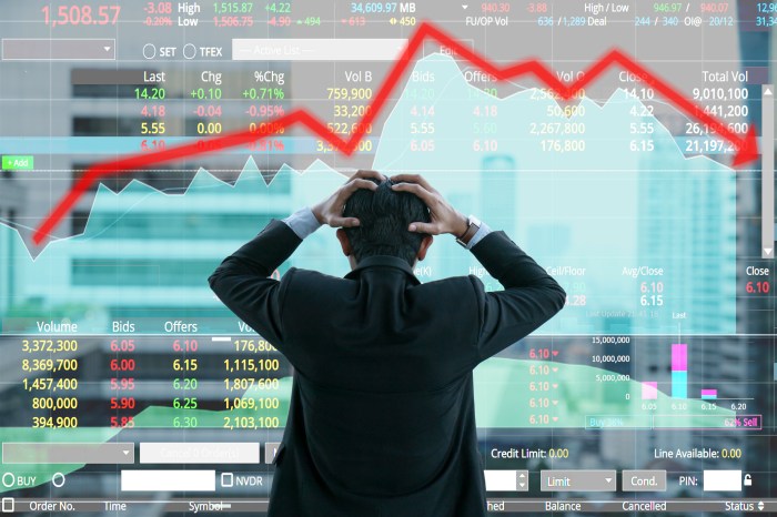 gigantes tecnologicos se van en picada bolsa de valores businessman grabs the head concept with business chart on scoreboard